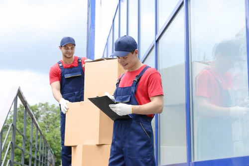 Commercial furniture and equipment being prepared for transport