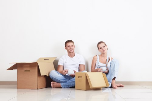 Loading furniture and boxes into a moving van