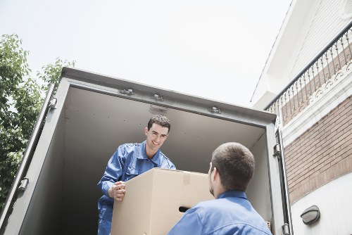 Trained movers handling furniture with care